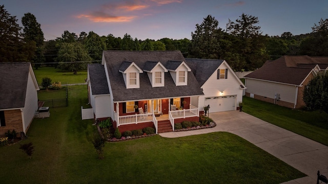 102 Water Mill Trce, Ringgold, GA 30736 - new england style home with a porch, driveway, a garage, and roof with shingles