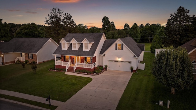 102 Water Mill Trce, Ringgold, GA 30736 - new england style home with a porch, concrete driveway, a front lawn, and a garage