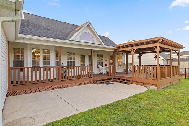 102 Water Mill Trce, Ringgold, GA 30736 - back of house featuring a shingled roof, a yard, and a patio area