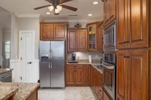 9704 Starry Way, Soddy Daisy, TN 37379 - kitchen featuring appliances with stainless steel finishes, brown cabinets, ceiling fan, glass insert cabinets, and recessed lighting
