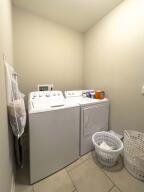 9704 Starry Way, Soddy Daisy, TN 37379 - laundry room featuring washer and dryer and tile patterned flooring