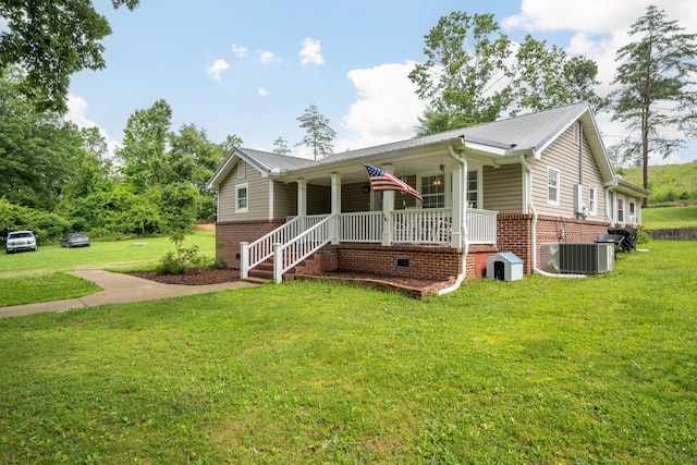 300 Bronco Rd, Lafayette, GA 30728 - ranch-style home with covered porch, central AC, a front lawn, and brick siding