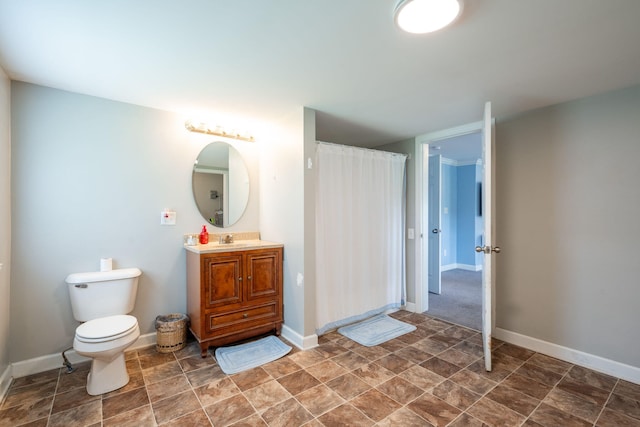 300 Bronco Rd, Lafayette, GA 30728 - full bathroom featuring vanity, toilet, a shower with shower curtain, stone finish flooring, and baseboards