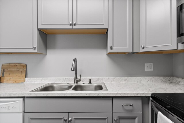 900 Mountain Creek Rd Unit P234, Chattanooga, TN 37405 - kitchen with a sink, dishwasher, gray cabinets, and light countertops