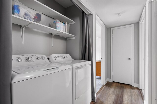 900 Mountain Creek Rd Unit P234, Chattanooga, TN 37405 - washroom featuring wood finished floors, washing machine and clothes dryer, and baseboards