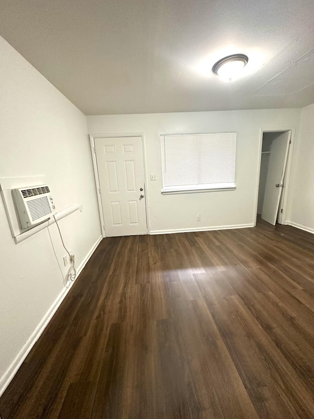 2011 Milne St, Chattanooga, TN 37406 - foyer entrance with dark wood-style flooring and a wall mounted AC