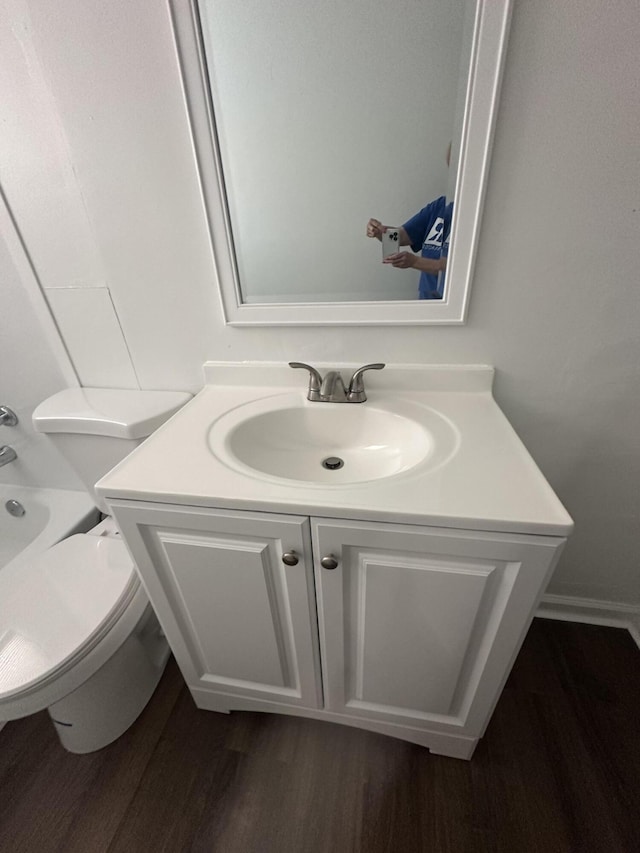 2011 Milne St, Chattanooga, TN 37406 - full bath with vanity, wood finished floors, and shower / tub combination