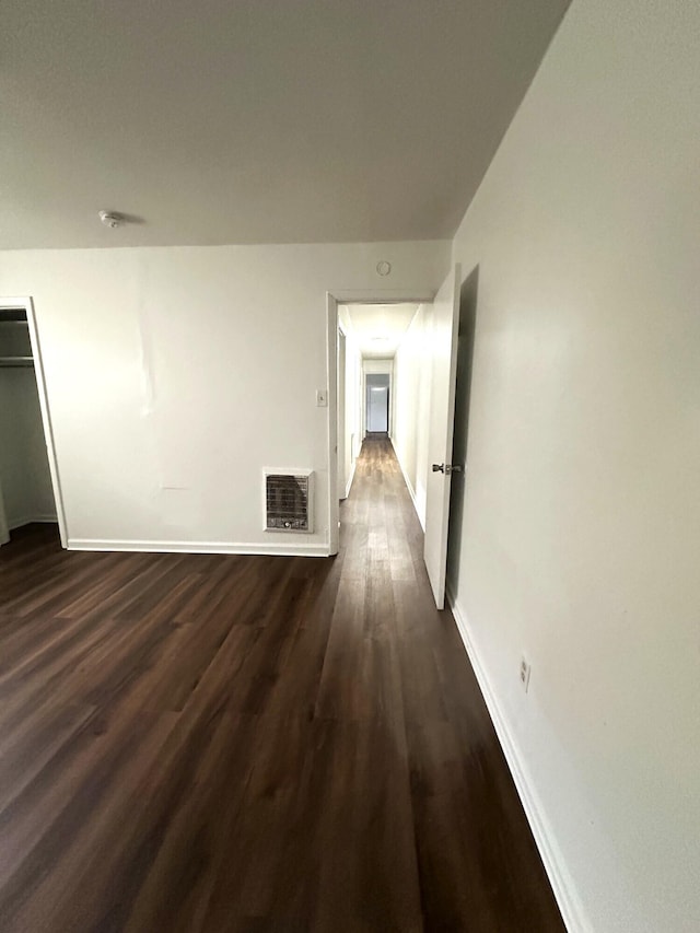 2011 Milne St, Chattanooga, TN 37406 - hallway with baseboards and dark wood-style flooring