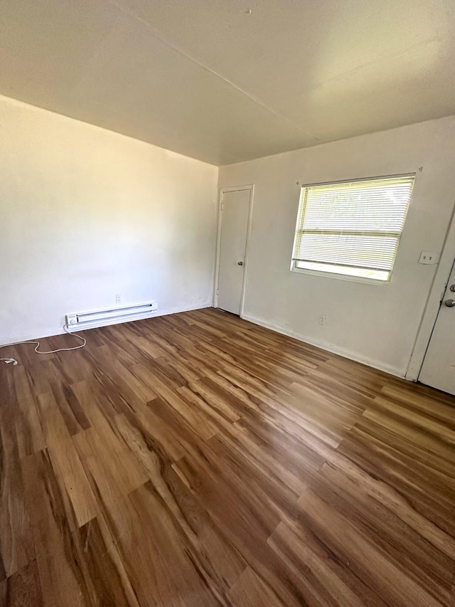 2011 Milne St, Chattanooga, TN 37406 - unfurnished room with baseboard heating and wood finished floors