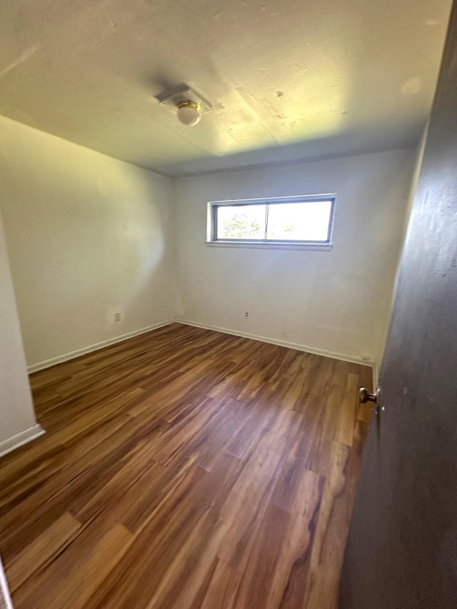 2011 Milne St, Chattanooga, TN 37406 - spare room with wood finished floors and baseboards