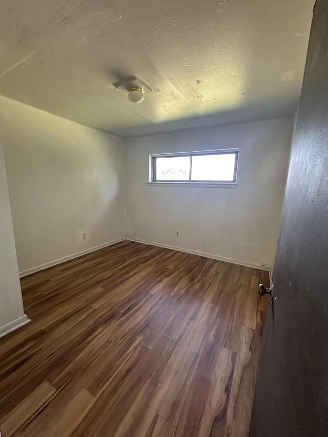 2011 Milne St, Chattanooga, TN 37406 - unfurnished room with wood finished floors and baseboards