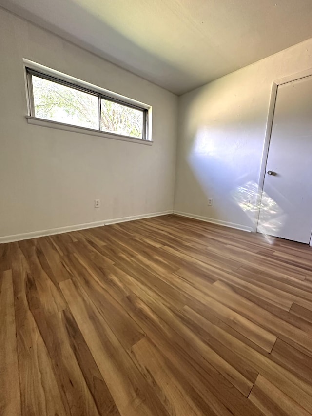 2011 Milne St, Chattanooga, TN 37406 - unfurnished room featuring wood finished floors and healthy amount of natural light