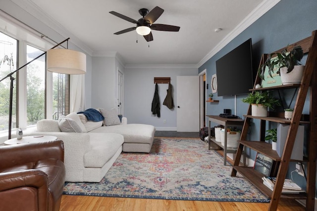 3606 Gleason Dr, Chattanooga, TN 37412 - living area with crown molding, a ceiling fan, and wood finished floors