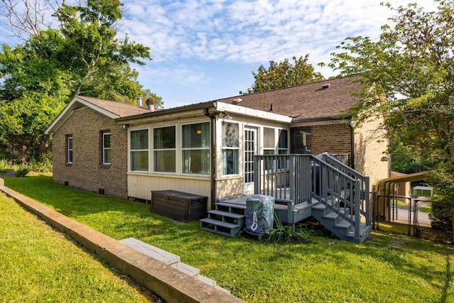 3606 Gleason Dr, Chattanooga, TN 37412 - rear view of property with brick siding, a lawn, a deck, and roof with shingles
