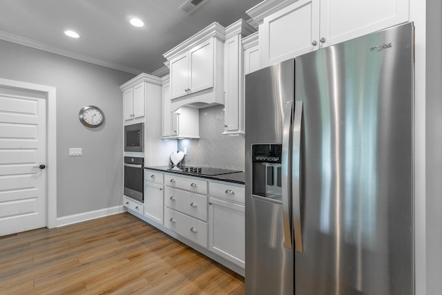 9058 Knolling Loop, Ooltewah, TN 37363 - kitchen with stainless steel appliances, ornamental molding, dark countertops, decorative backsplash, and white cabinets