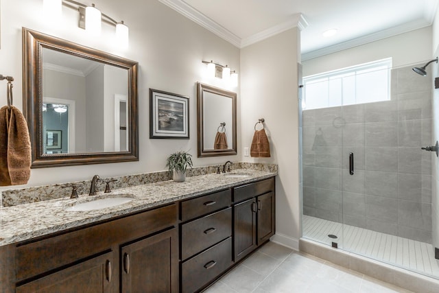 9058 Knolling Loop, Ooltewah, TN 37363 - full bathroom featuring double vanity, a shower stall, crown molding, tile patterned floors, and baseboards