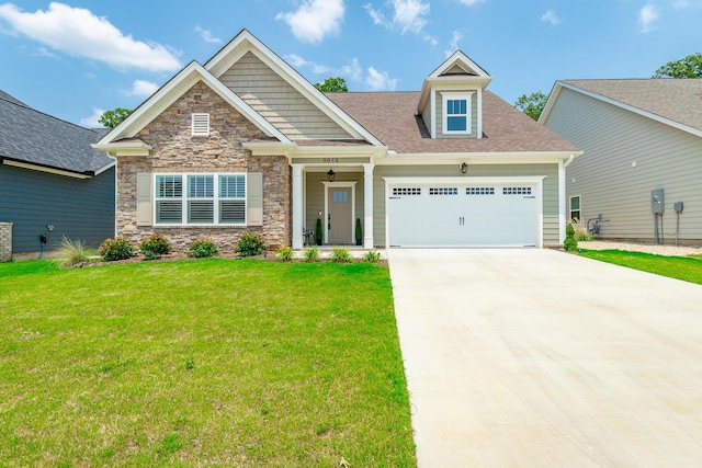9058 Knolling Loop, Ooltewah, TN 37363 - craftsman-style home with a garage, a front lawn, driveway, stone siding, and roof with shingles