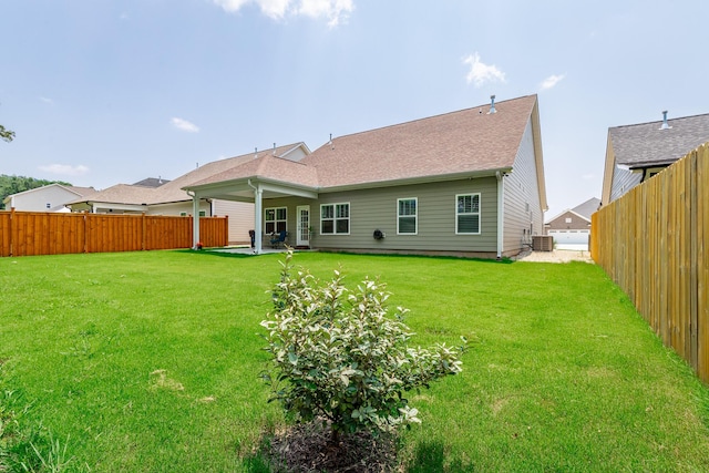 9058 Knolling Loop, Ooltewah, TN 37363 - back of property featuring a patio and central AC