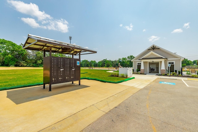 9058 Knolling Loop, Ooltewah, TN 37363 - surrounding community with mail area and uncovered parking