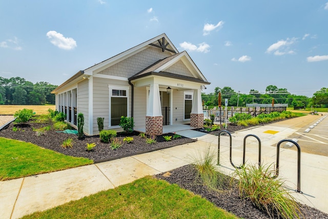 9058 Knolling Loop, Ooltewah, TN 37363 - craftsman-style house featuring covered porch