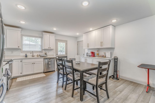 2091 Hummingbird Dr, Dalton, GA 30721 - dining area featuring light wood-style floors and recessed lighting