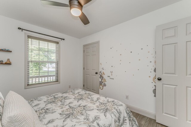 2091 Hummingbird Dr, Dalton, GA 30721 - bedroom featuring light wood-style flooring and ceiling fan