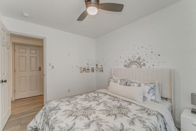 2091 Hummingbird Dr, Dalton, GA 30721 - bedroom with wood finished floors and a ceiling fan