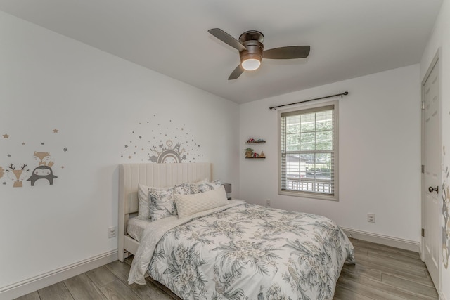 2091 Hummingbird Dr, Dalton, GA 30721 - bedroom with wood finished floors and ceiling fan