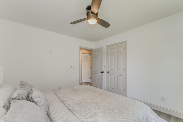 2091 Hummingbird Dr, Dalton, GA 30721 - bedroom with wood finished floors and a ceiling fan