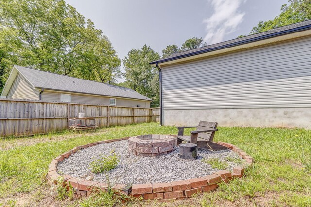 2091 Hummingbird Dr, Dalton, GA 30721 - view of yard with an outdoor fire pit