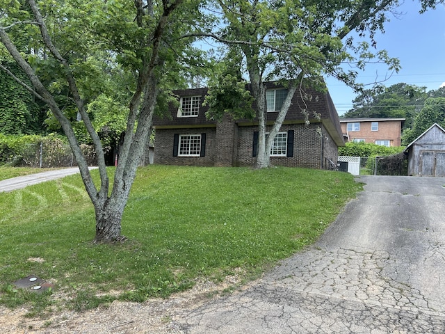 3955 Teakwood Dr, Chattanooga, TN 37416 - view of front of property with brick siding, driveway, and roof with shingles