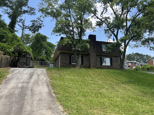 3955 Teakwood Dr, Chattanooga, TN 37416 - view of front of property with brick siding and a gate