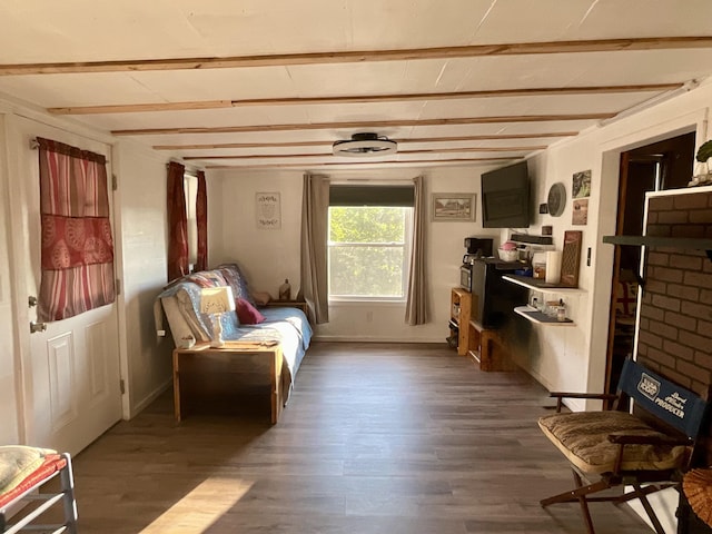 690 Ditch Gap Rd, Whitwell, TN 37397 - sitting room featuring dark wood-style flooring, baseboards, and beam ceiling