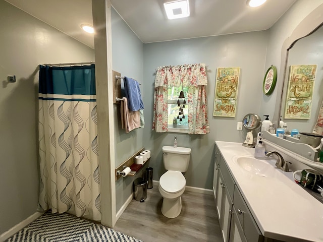 690 Ditch Gap Rd, Whitwell, TN 37397 - full bathroom with toilet, vanity, wood finished floors, baseboards, and a shower with curtain