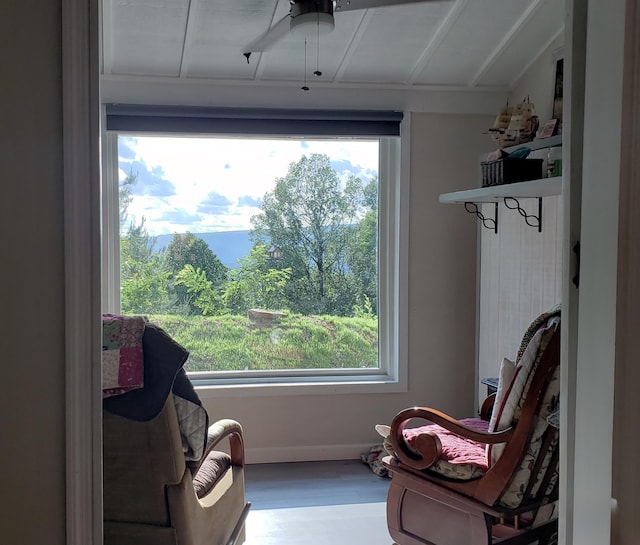 690 Ditch Gap Rd, Whitwell, TN 37397 - sitting room with healthy amount of natural light, wood finished floors, and a ceiling fan