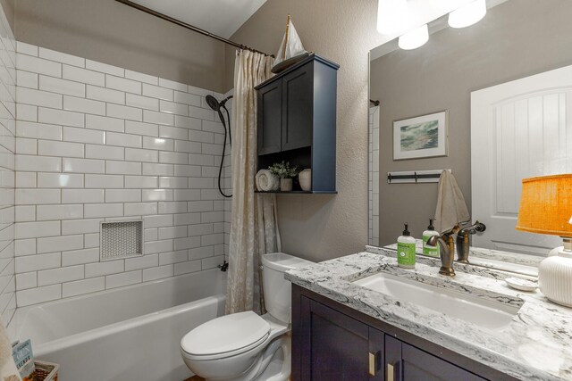 2311 Waterhaven Dr, Chattanooga, TN 37406 - full bathroom featuring shower / tub combo with curtain, vanity, and a textured wall
