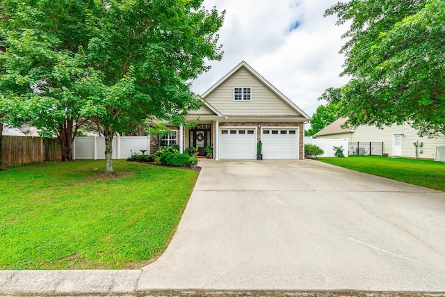 2311 Waterhaven Dr, Chattanooga, TN 37406 - traditional-style house with driveway, an attached garage, and brick siding