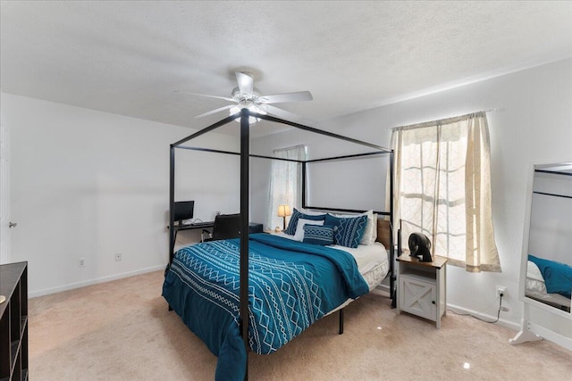 487 Ridge Rd, Lafayette, GA 30728 - bedroom with carpet flooring, baseboards, a textured ceiling, and a ceiling fan