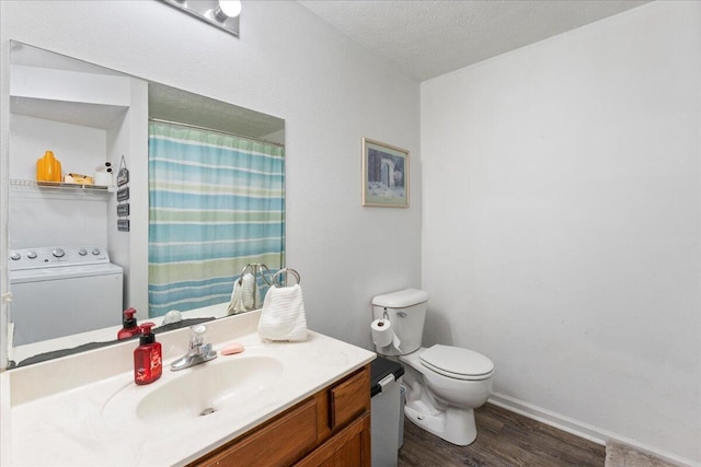 487 Ridge Rd, Lafayette, GA 30728 - full bathroom with washer / dryer, toilet, vanity, wood finished floors, and a textured ceiling
