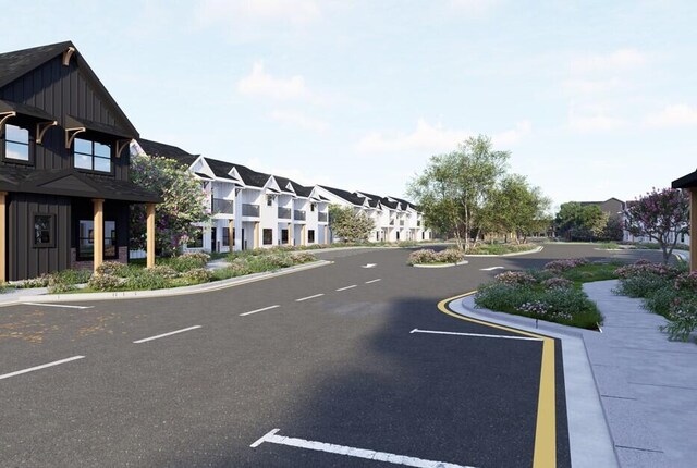 1091 Kinsey Dr, Chattanooga, TN 37421 - view of asphalt street featuring a residential view, curbs, and sidewalks