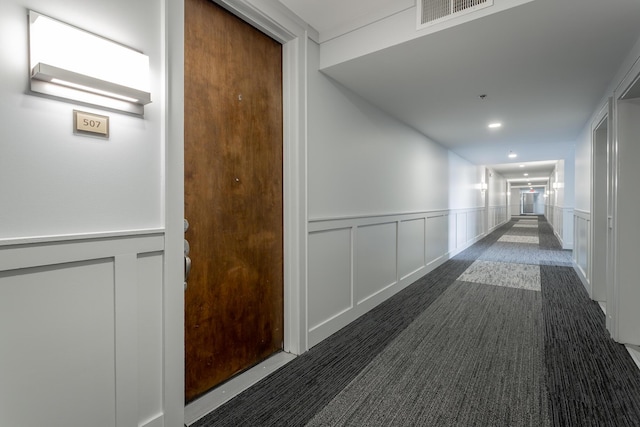 200 Manufacturers Rd Apt 507, Chattanooga, TN 37405 - hall featuring a decorative wall and a wainscoted wall