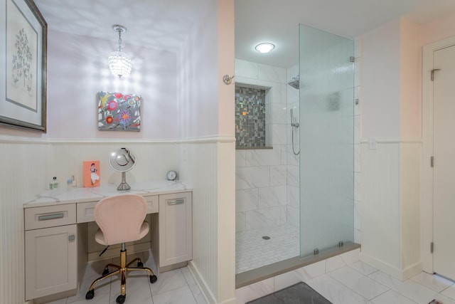 200 Manufacturers Rd Apt 507, Chattanooga, TN 37405 - full bathroom featuring a walk in shower, marble finish flooring, and wainscoting