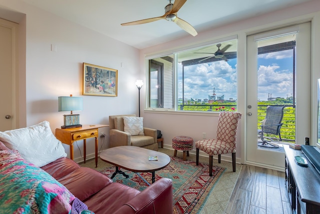 200 Manufacturers Rd Apt 507, Chattanooga, TN 37405 - living area featuring ceiling fan, plenty of natural light, and wood finished floors