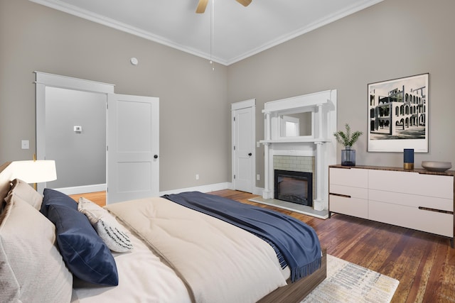 208 E Villanow St, Lafayette, GA 30728 - bedroom with ornamental molding, wood finished floors, a glass covered fireplace, baseboards, and ceiling fan