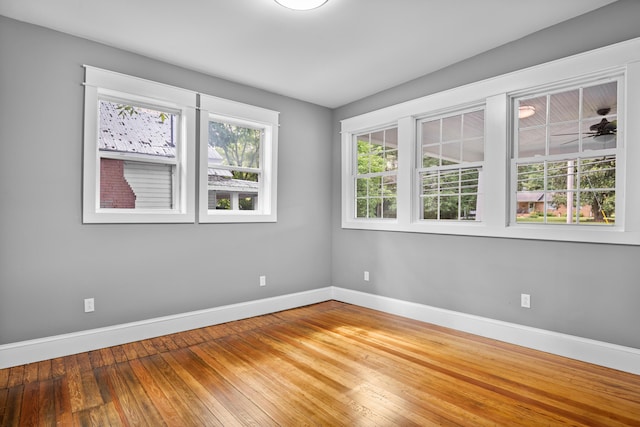 208 E Villanow St, Lafayette, GA 30728 - unfurnished room with baseboards and hardwood / wood-style flooring
