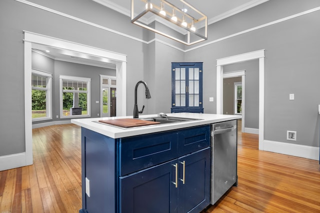 208 E Villanow St, Lafayette, GA 30728 - kitchen featuring stainless steel dishwasher, blue cabinets, light wood finished floors, light countertops, and baseboards