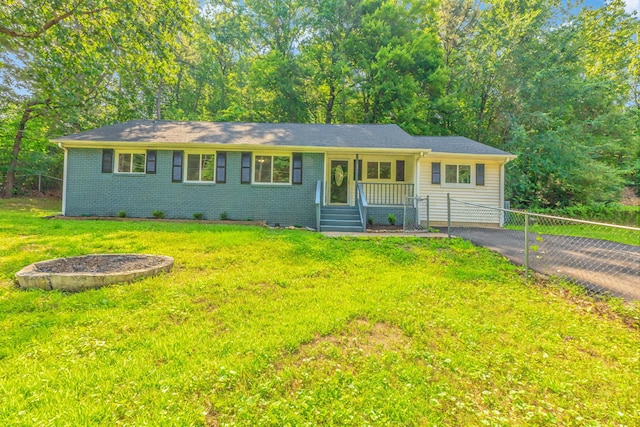 1806 Dallas Lake Rd, Soddy Daisy, TN 37379 - ranch-style home with asphalt driveway, brick siding, and a porch