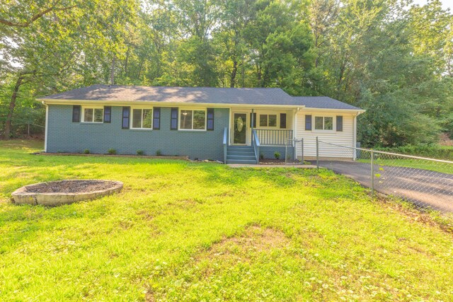 1806 Dallas Lake Rd, Soddy Daisy, TN 37379 - ranch-style home featuring covered porch, asphalt driveway, and brick siding