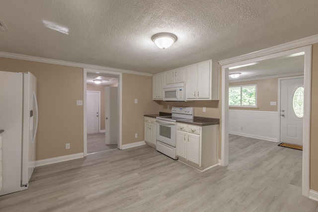 1806 Dallas Lake Rd, Soddy Daisy, TN 37379 - kitchen featuring white appliances, a textured ceiling, light wood-style flooring, dark countertops, and white cabinets
