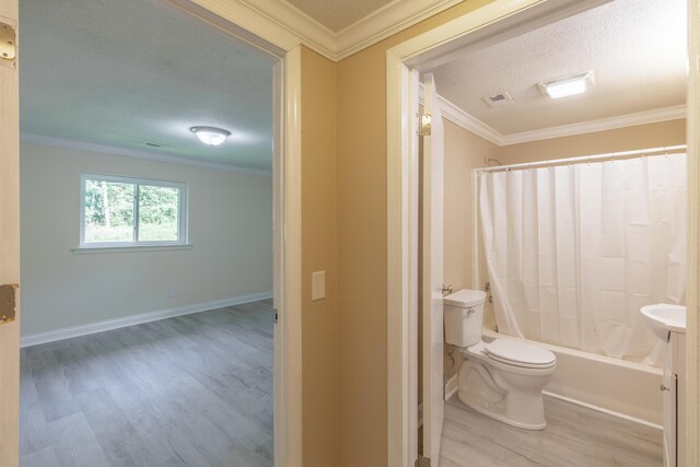 1806 Dallas Lake Rd, Soddy Daisy, TN 37379 - bathroom with wood finished floors, ornamental molding, toilet, shower / bathtub combination with curtain, and a textured ceiling